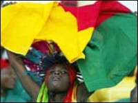 Cameroon ease into top spot 