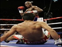 Classy Mayweather pummels Marquez 