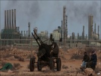 Gaddafi troops take rebel oil town Libya